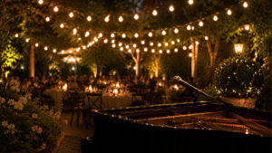 outdoor concert shabbat series string lights piano and people dining in the background